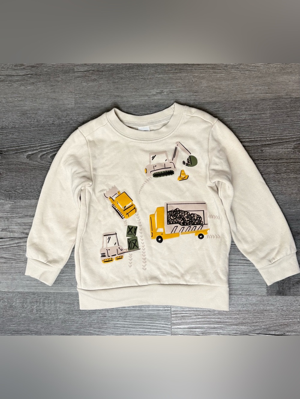 Carter's Cream Sweatshirt with Yellow Construction Trucks. Boys size 2T